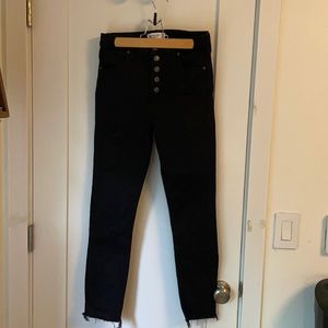 Black button front frayed hem ankle length skinny